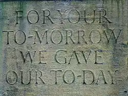 The epitaph with Gill lettering