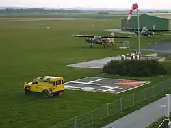 View from control tower towards fuel station and windsock
