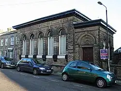 Nos 34 and 36 (former bank building and attached boundary wall)