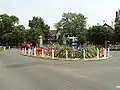 Roundabout at the north end of Gallery Road at the junction with Dulwich Village.