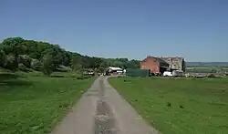 Hacking Hall with wall enclosing garden to north west