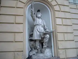 Robert Stigell's 1888 sculpture at Vanha Ylioppilastalo (Old Student House) in Helsinki depicts Väinämöinen with the first kantele, made of a giant pike's jawbone, as told in the Kalevala national epic.]]