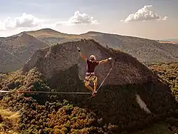 Alex Schulz on a stormy highline in France