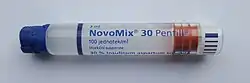 clear glass tube labelled Novomix 30 containing a cloudy white liquid