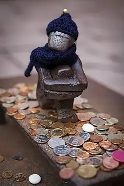 Järnpojke, little boy looking at the Moon, the smallest statue in Stockholm.