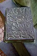 Sculpture of book Story of a Secret State