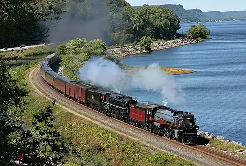 No. 2816 double heading with Milwaukee Road 261 while traveling on the CP's River Subdivision at Maple Springs, Minnesota, on September 15, 2007