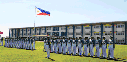 MAAP midshipmen in formation in front of JSU-IMMAJ campus.