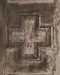 Photograph of a mandala carving on wooden door panel. Fua Mulaku Island, 1986