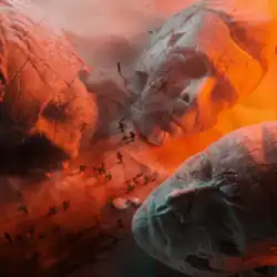 A group of figures surround destroyed statues resembling the faces of the band members, with graffiti sprayed on each face.