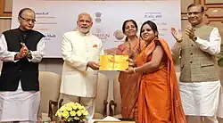 The Prime Minister, Shri Narendra Modi launches the Gold schemes, in New Delhi on November 05, 2015. The Union Minister for Finance, Corporate Affairs and Information & Broadcasting, Shri Arun Jaitley, the Minister of State for Finance, Shri Jayant Sinha and the Minister of State for Commerce & Industry (Independent Charge), Smt. Nirmala Sitharaman are also seen.