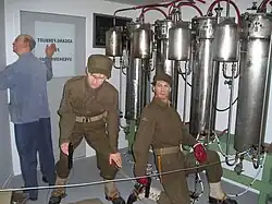 A reconstruction of the Operation Gunnerside team planting explosives to destroy the cascade of electrolysis chambers.
