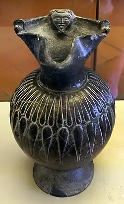 Oinochoe with mold decoration, 550-500 BCE