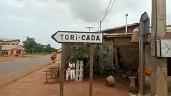 A sign pointing to Tori-Cada