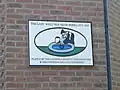 Plaque showing the site of the original well from which Ladywell takes its name. The building that the plaque is attached to is Lister House, located next to Ladywell railway station.