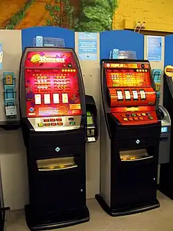 Veikkaus gamehall inside a Prisma (chain store) showing RAY's Ruusu and Tuplapotti slot machines