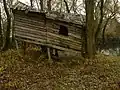 Cabin on stilts near the Uh river branch
