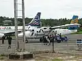 Batavia Air Boeing 737 and Merpati Nusantara Airlines DHC-6 Twin Otter at Rendani Airport
