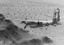 U.S. Navy S-2E Tracker from Anti-Submarine Squadron 37 carrying a four-rocket pod of Zuni 127 mm Folding-Fin Aircraft Rockets below its port wing (1970)