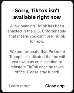 Screenshot of an error message displayed on TikTok's mobile app taken on an iPhone. The title reads "Sorry, TikTok isn't available right now." The body text reads, "A law banning TikTok has been enacted in the U.S. Unfortunately, this means that you can't use TikTok for now. We are fortunate that President Trump has indicated that he will work with us on a solution to reinstate TikTok once he takes office. Please stay tuned!" 2 options are available, the left reading "Learn more", and the right reading "Close app."