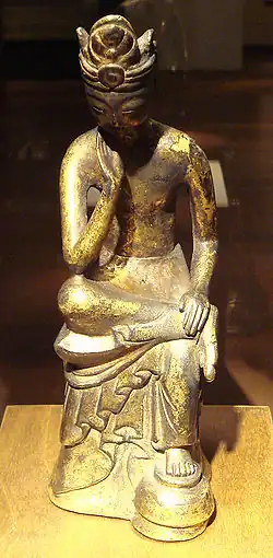 Pensive Bodhisattva Maitreya, Baekje, late 6th century. Gilt bronze, H. 5.5 cm; L.: 5.5