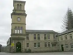 Shaw Lodge Mill weaving sheds and clock tower