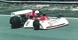 Brett Lunger entering Hawthorn's Bend at Brands Hatch during the 1976 British Grand Prix in a TS19.