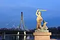 Mermaid of Warsaw in front of the bridge