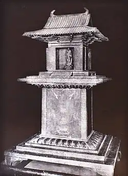 A black and white photograph of the Tamamushi Shrine