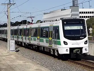 Electric passenger train on railway tracks