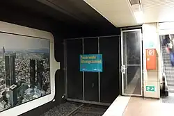 Gates across the track at the end of an underground station platform