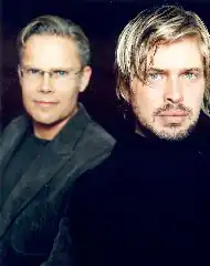 A picture of two men looking straight to camera