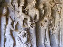 Reliefs of a number of people