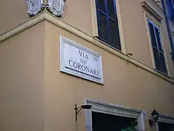 Historic marble street sign in Rome, Italy