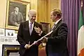 Irish Taoiseach Enda Kenny gives Biden a hurling stick (2016)