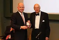 The 2nd Viscount (right), receiving the Canning Medal from William Hague in 2013