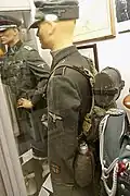 Enlisted "frontkjemper" ("Frontfighter" a Norwegian Waffen-SS volunteer) SS-Mann (private) of the Regiment Nordland, with visiblebackpack, canteen and lunch box; Lofoten War Museum, Norway.