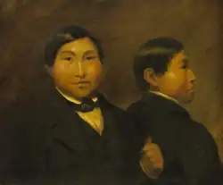 A double portrait, showing two different angles of the upper body of Qalaherriaq, dressed in a European-style suit