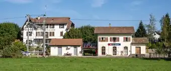 Two-story building with gabled roof