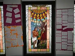 Artwork depicting the Baptism of Jesus within the baptistery inside the National Cathedral