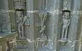 Adam and Eve with the Tree of Knowledge between them have been unable resist temptation and cover their nakedness
