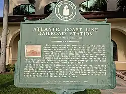 Historical marker located at the former railroad depot