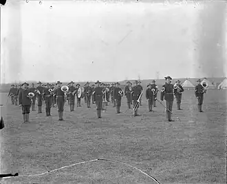 Band of the 14th Infantry Regiment, Col. Dent commanding, at Fort Ripley, there are tents visible at right.