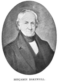 old man with white hair and dressed formally