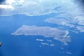 View of the village (on the shoreline in the far background)