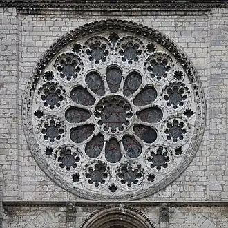 Plate tracery. Early Gothic plate tracery, west rose window of Chartres Cathedral (12th century)