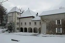 Outside of Chartreuse de Pomier on a snowy day