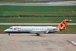 Small jetliner with aft-mounted twin engines