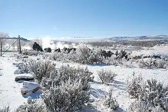Winter view of the suspension footbridge over the Big Horn River