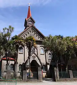 Front of old church in unusual style.